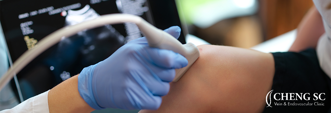 Doctor Conducting A Vascular Ultrasound